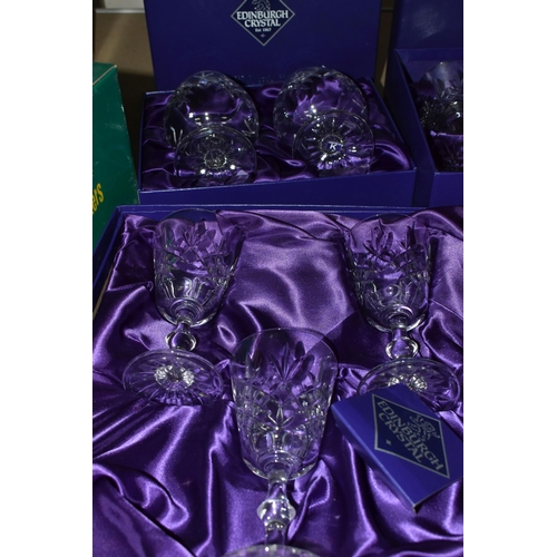 610 - A COLLECTION OF EDINBURGH CRYSTAL, comprising four boxed sets of Edinburgh Crystal drinking glasses:... 