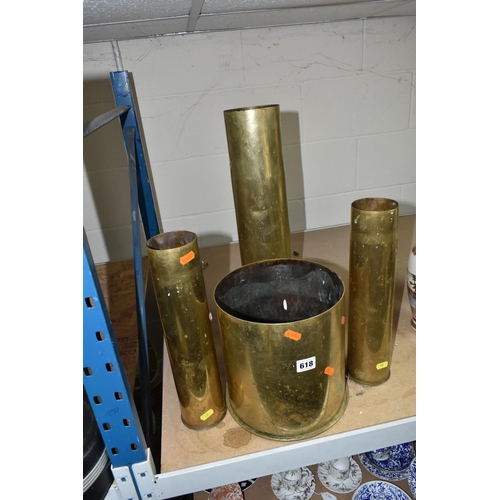 618 - FOUR BRASS SHELL CASES, comprising a German 8.5 inch case dated 1917, a German 4 inch case and two B... 