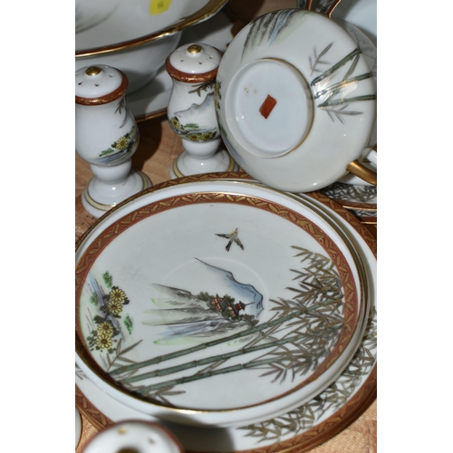 634 - A JAPANESE DINNER SERVICE, comprising seven cups, eight saucers and side plates, twelve dinner plate... 