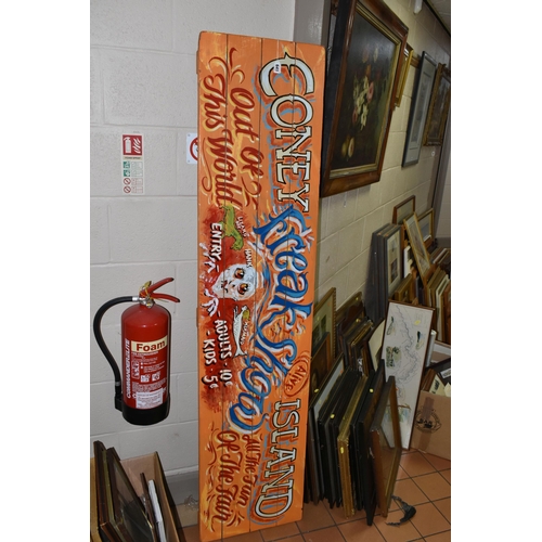 641 - A MODERN HANDPAINTED FAIRGROUND SIGN, sign written 'Coney Island Freak Show', oil on wood, approxima... 