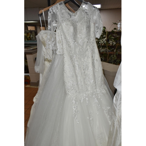 653 - A GROUP OF WEDDING DRESSES, retail stock clearance, assorted styles to include princess line, A line... 