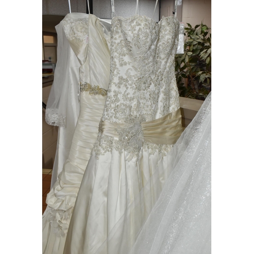 653 - A GROUP OF WEDDING DRESSES, retail stock clearance, assorted styles to include princess line, A line... 