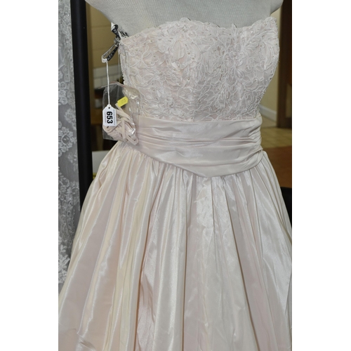 653 - A GROUP OF WEDDING DRESSES, retail stock clearance, assorted styles to include princess line, A line... 