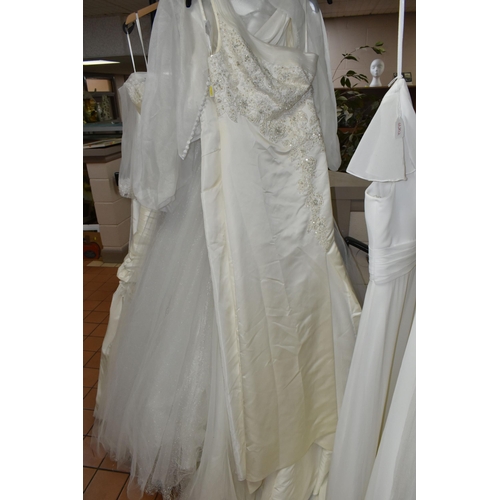 653 - A GROUP OF WEDDING DRESSES, retail stock clearance, assorted styles to include princess line, A line... 