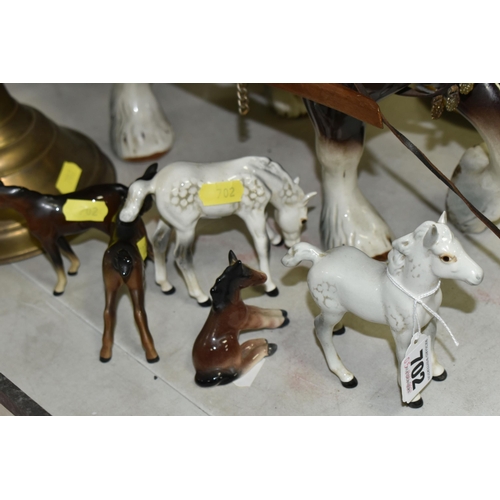 702 - A GROUP OF FOUR BESWICK WHITE AND BROWN GLOSS FOALS, ANOTHER FOAL, A SHIRE HORSE WITH WOODEN CART AN... 