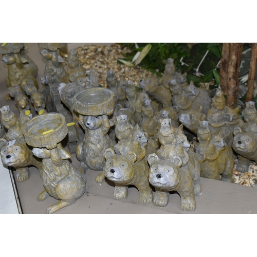 711 - A QUANTITY OF RESIN RUSTIC ANIMAL FIGURES AND CANDLE HOLDERS, comprising five Rabbit candle holders,... 