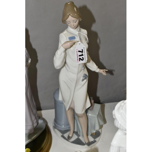 712 - TWO LLADRO FIGURES, comprising Female Physician no 5197, designed by Salvador Debon 1984, retired 20... 