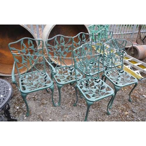 A SET OF SIX GREEN PAINTED CAST ALULUMINIUN FLORAL GARDEN CHAIRS, including two armchairs (condition