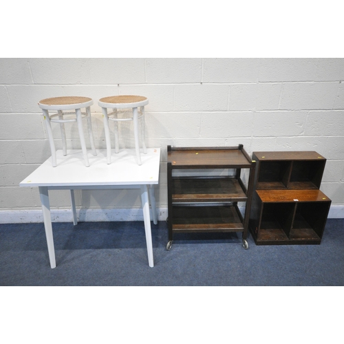 1295 - AN OAK TWO TIER OPEN BOOKCASE, along with an oak tea trolley, a white Formica kitchen table and two ... 