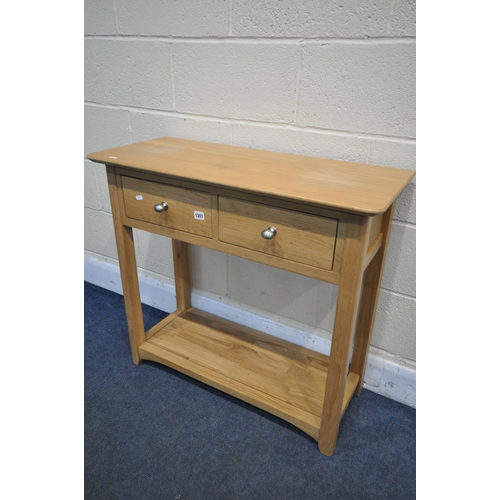 1301 - A MODERN LIGHT OAK SIDE TABLE, with two drawers, width 85cm x depth 36cm x height 78cm (condition:-w... 