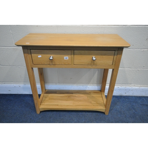 1301 - A MODERN LIGHT OAK SIDE TABLE, with two drawers, width 85cm x depth 36cm x height 78cm (condition:-w... 