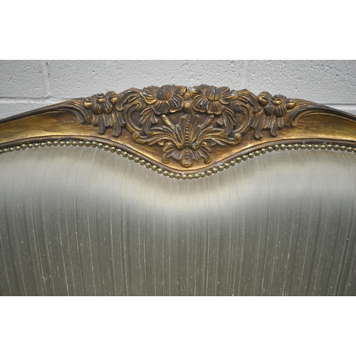 1308 - A FRENCH LOUIS XV STYLE GILT WOOD SOFA, with foliate decoration, with six legs, length 127cm x depth... 