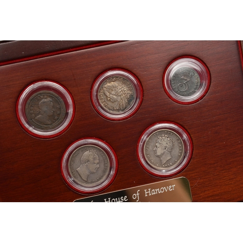 209 - A CASED DISPLAY THE HOUSE OF HANOVER COLLECTION, to include George IV Shilling 1826, William IV Shil... 