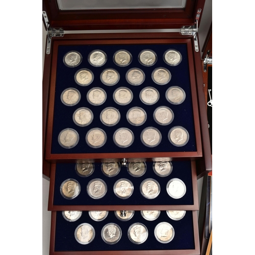 212 - A BOXED DISPLAY OF AMERICAN SILVER DOLLAR COINS, to include five different finishes genuine reverse ... 