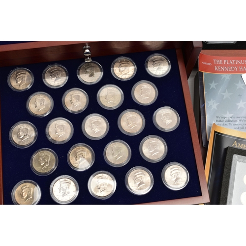 212 - A BOXED DISPLAY OF AMERICAN SILVER DOLLAR COINS, to include five different finishes genuine reverse ... 