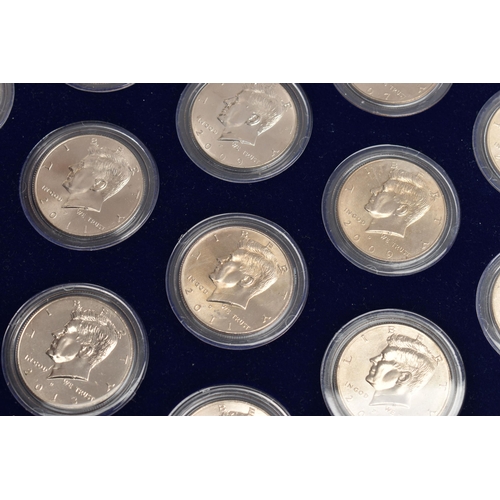 212 - A BOXED DISPLAY OF AMERICAN SILVER DOLLAR COINS, to include five different finishes genuine reverse ... 