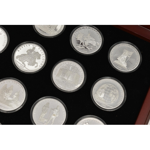 215 - A LARGE GLAZED BOX THE HISTORY OF BRITAIN SILVER BULLION PART COLLECTION, 27x  .999 silver 1oz  proo... 