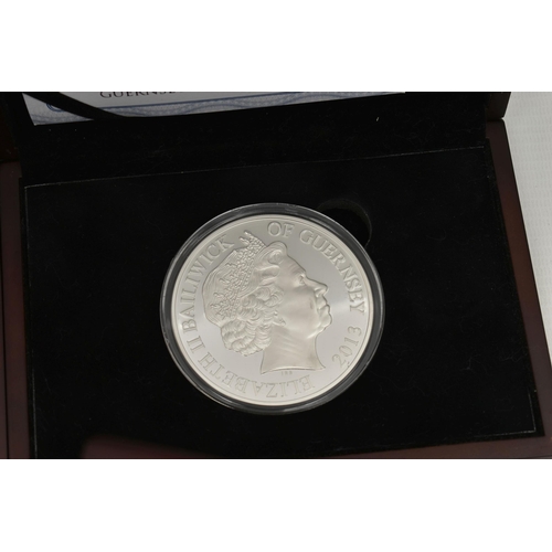 218 - A QUANTITY OF BOXED COINAGE, to include a 5 Ounce proof Ten Pounds coin I.O.M. 2019 Moon Landing 50t... 