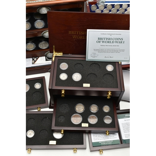 228 - A LARGE AND HEAVY BOX OF CASED UK COINAGE, to include the complete Shilling collection (58) 29 year ... 