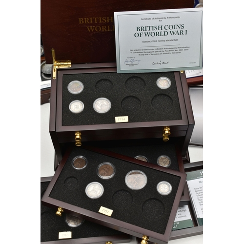 228 - A LARGE AND HEAVY BOX OF CASED UK COINAGE, to include the complete Shilling collection (58) 29 year ... 