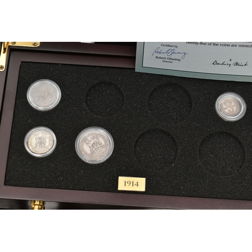 228 - A LARGE AND HEAVY BOX OF CASED UK COINAGE, to include the complete Shilling collection (58) 29 year ... 