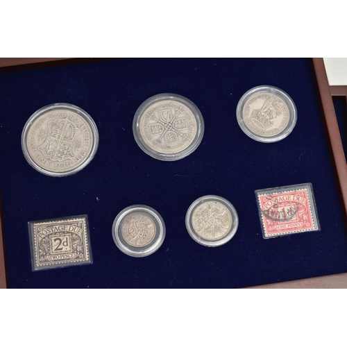 229 - A GLAZED DISPLAY BOX THREE DECADES of GEORGE V STAMP AND COIN SET, to include four trays of silver c... 