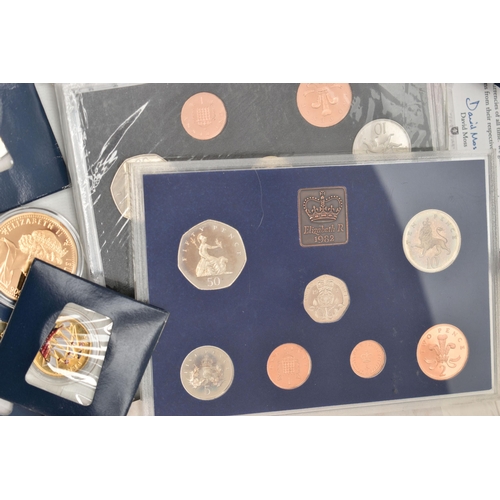 234 - A LARGE PLASTIC BOX OF COINAGE, to include a boxed 2009 .958 silver Britannia, 2008 Christmas Gold A... 