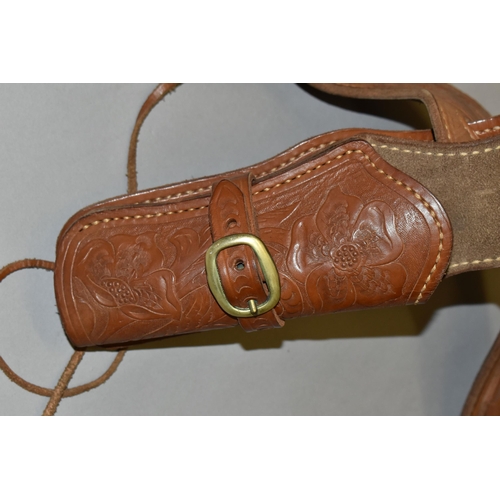 634 - A GOOD QUALITY HEAVILY TOOLED GUN BELT AND HOLSTER, with a number of inert cartridges