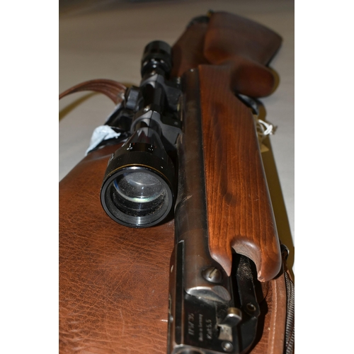 635 - A .22'' WEIHRAUCH HW 35 AIR RIFLE, serial number 124206, fitted with a Sterling Silver Crown 3.9x40 ... 