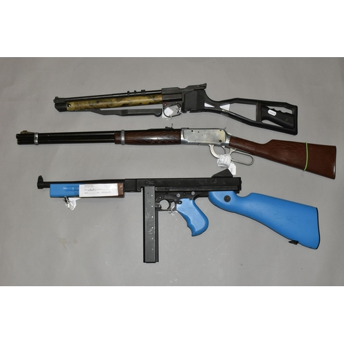 654 - A BB DAISY SPRING OPERATED MODEL 1894 AIR RIFLE, together with a blue painted BB copy of the Thompso... 