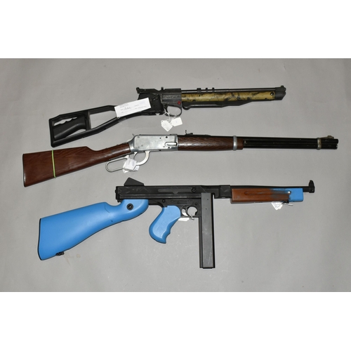 654 - A BB DAISY SPRING OPERATED MODEL 1894 AIR RIFLE, together with a blue painted BB copy of the Thompso... 