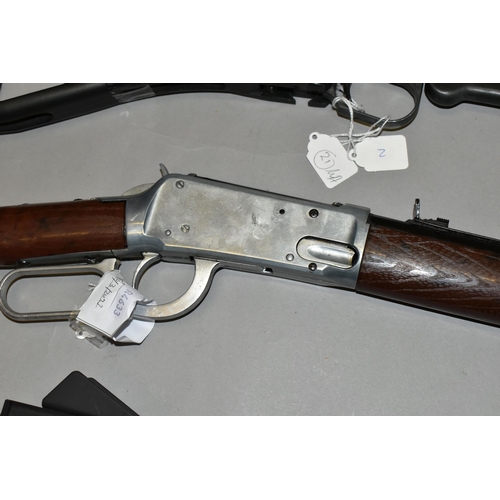 654 - A BB DAISY SPRING OPERATED MODEL 1894 AIR RIFLE, together with a blue painted BB copy of the Thompso... 