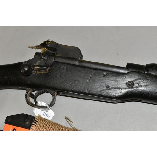 656 - A BB SPRING OPERATED BOLT ACTION AIR RIFLE, fitted with a scope, bearing no make or serial number, i... 