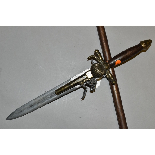 659 - A COPY OF A MEDIEVAL HAND AXE, a replica flintlock pistol and a replica flintlock knife pistol (3)