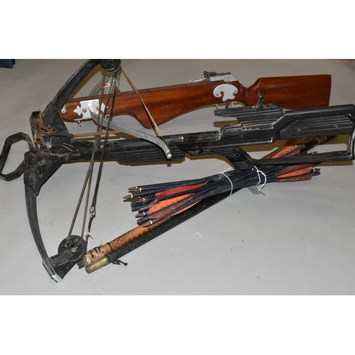 667 - A COMPOUND BARNETT CROSSBOW, together with another unnamed crossbow, fourteen shaft, an antique swor... 