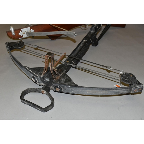 667 - A COMPOUND BARNETT CROSSBOW, together with another unnamed crossbow, fourteen shaft, an antique swor... 