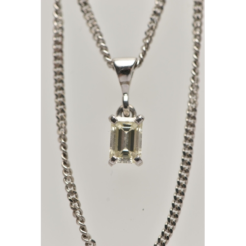 1 - A DIAMOND PENDANT NECKLACE, the emerald cut diamond within a four claw setting suspended from a curb... 