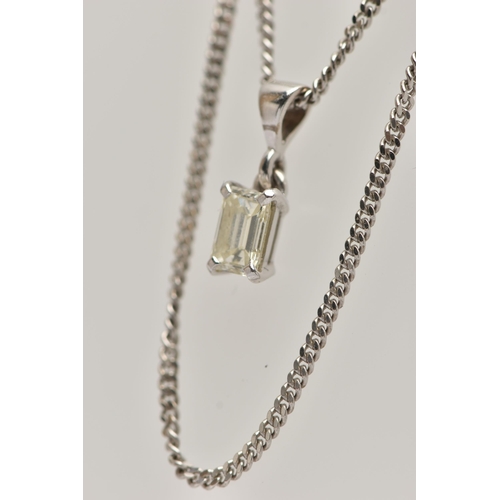 1 - A DIAMOND PENDANT NECKLACE, the emerald cut diamond within a four claw setting suspended from a curb... 