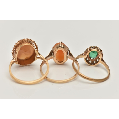 111 - THREE 9CT GOLD GEM SET RINGS, to include a cameo ring displaying a rose, collet set with a fine rope... 