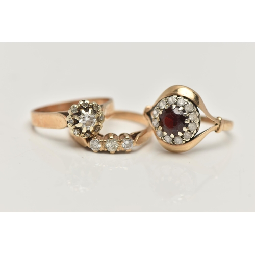 12 - THREE GEM SET RINGS, the first a 9ct gold diamond cluster ring, estimated total diamond weight 0.20c... 