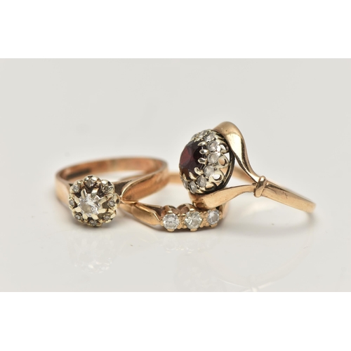 12 - THREE GEM SET RINGS, the first a 9ct gold diamond cluster ring, estimated total diamond weight 0.20c... 