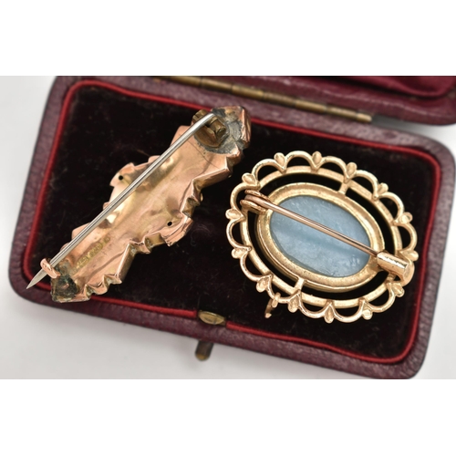 122 - TWO 9CT GOLD BROOCHES, the first a late Victorian elongated brooch with scrolling and rope twist des... 