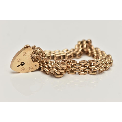 15 - A 9CT GOLD BRACELET, brick link bracelet, hallmarked 9ct Birmingham, fitted with a heart padlock cla... 