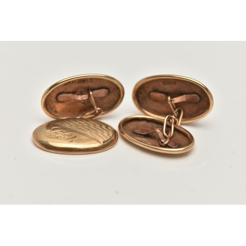 23 - A PAIR OF 9CT GOLD CUFFLINKS, oval chain link cufflinks with an engine turned pattern and engraved i... 