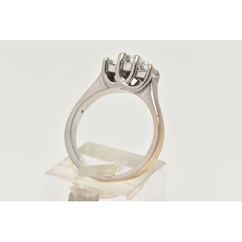 3 - AN 18CT GOLD THREE STONE DIAMOND RING, the tiered design claw set with three millennium cut diamonds... 