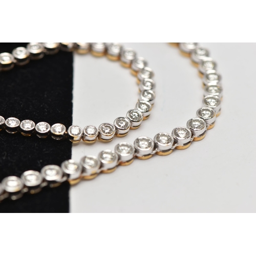 4 - A GRADUATED DIAMOND LINE NECKLACE, an articulated line of graduated round brilliant cut diamonds eac... 