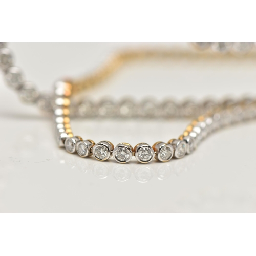 4 - A GRADUATED DIAMOND LINE NECKLACE, an articulated line of graduated round brilliant cut diamonds eac... 