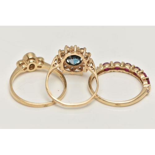 40 - THREE 9CT GOLD GEM SET RINGS, to include a topaz and cubic zirconia cluster ring, hallmarked 9ct Bir... 