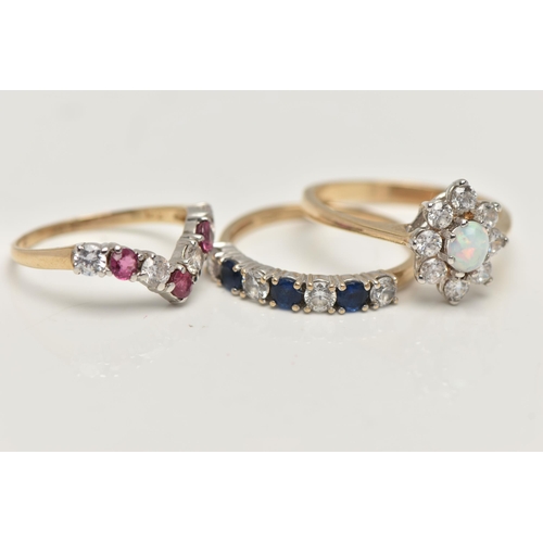 41 - THREE 9CT GOLD GEM SET RINGS, to include a blue and colourless cubic zirconia half eternity ring, ha... 