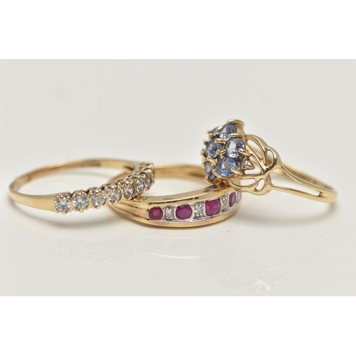 43 - THREE 9CT GOLD GEM SET RINGS, to include a ruby and diamond half eternity ring, hallmarked 9ct Londo... 